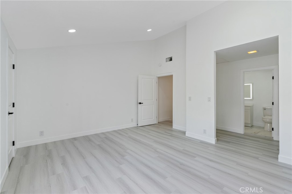 936 Fairway, Unit 8 Grand Terrace, CA 92324 - Photo 21 of 26 wooden floor in an empty room