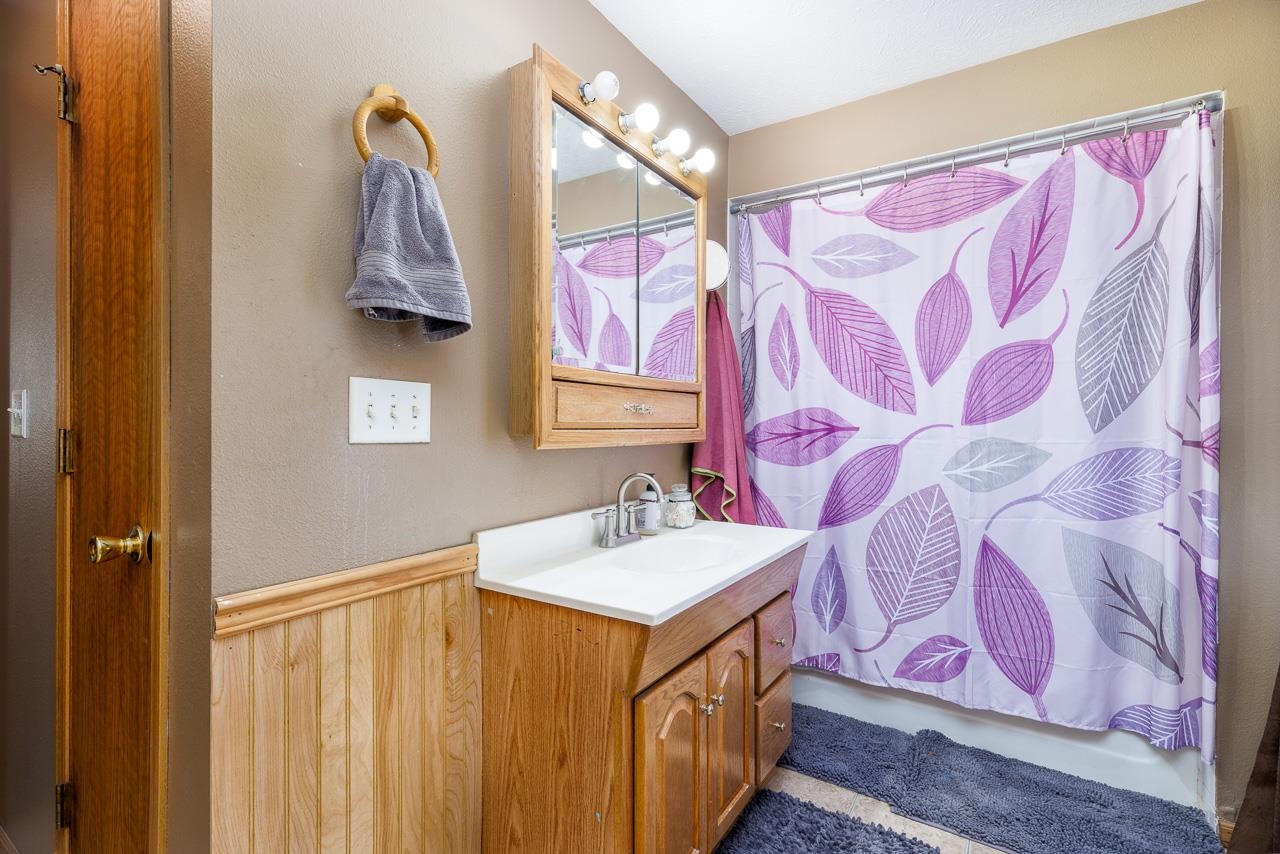 511 North Salisbury Davis, IL 61019 - Photo 15 of 24 a bathroom with a sink and a mirror