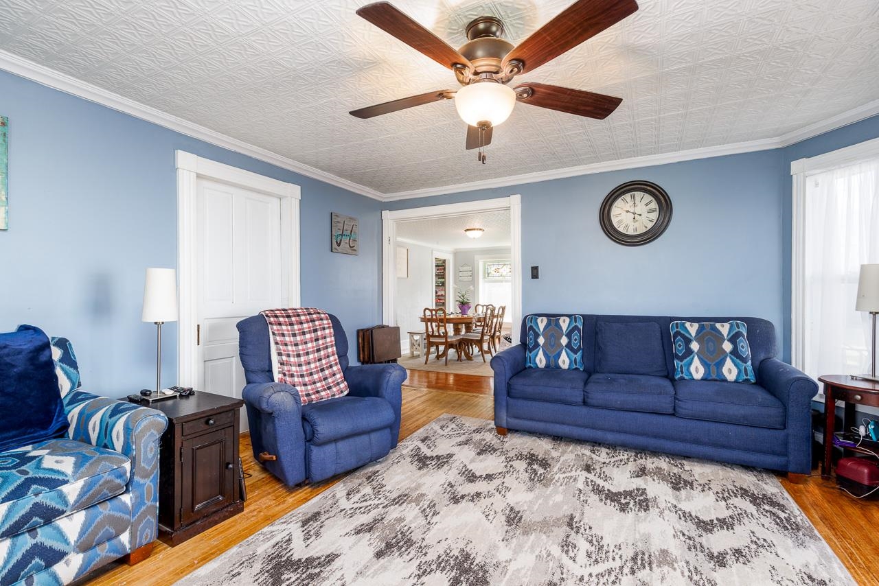 511 North Salisbury Davis, IL 61019 - Photo 4 of 24 a living room with couch cabinet and a window