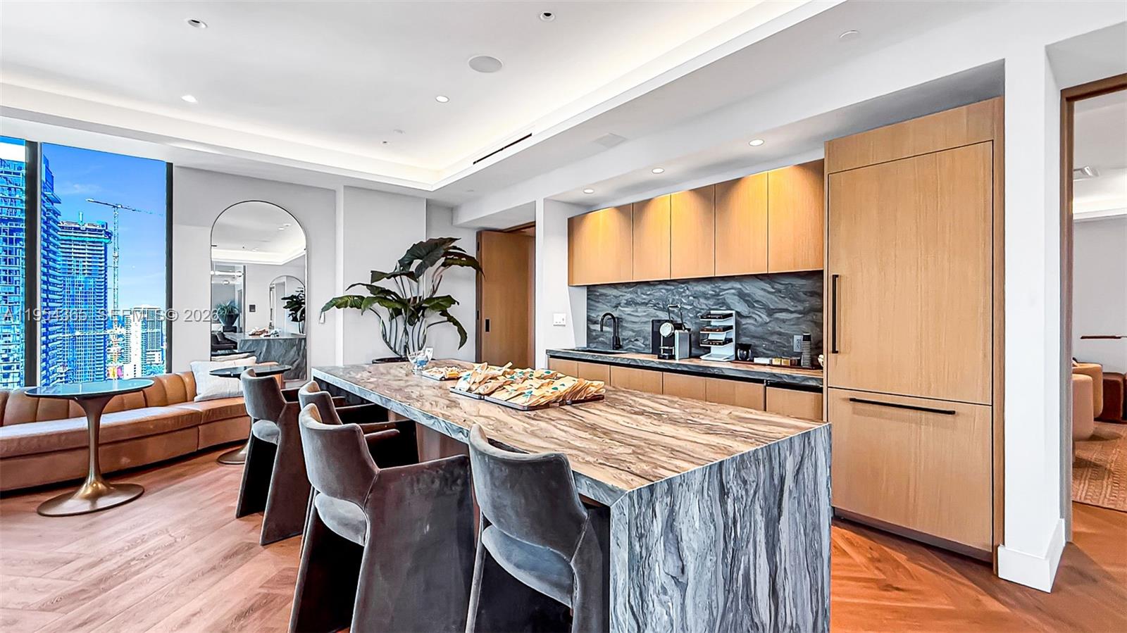 121 Northeast 5th Street, Unit 1608 Miami, FL 33132 - Photo 16 of 31 a view of a dining room with furniture window and wooden floor