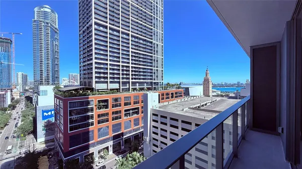 a view of a balcony with city view