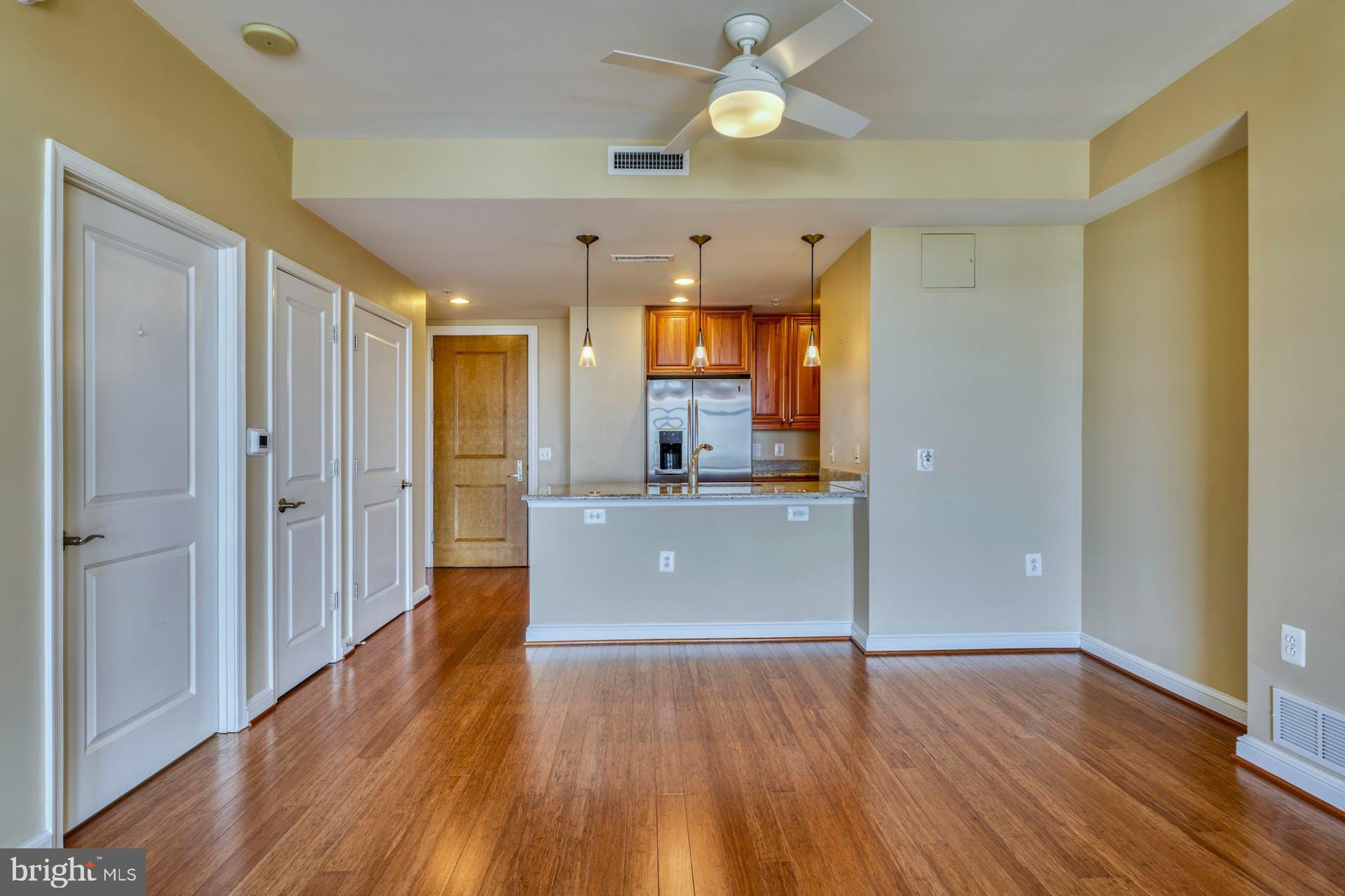 11990 Market Street, Unit 1314 Reston, VA 20190 - Photo 17 of 44 VIEW FROM LIVING ROOM TOWARDS KITCHEN