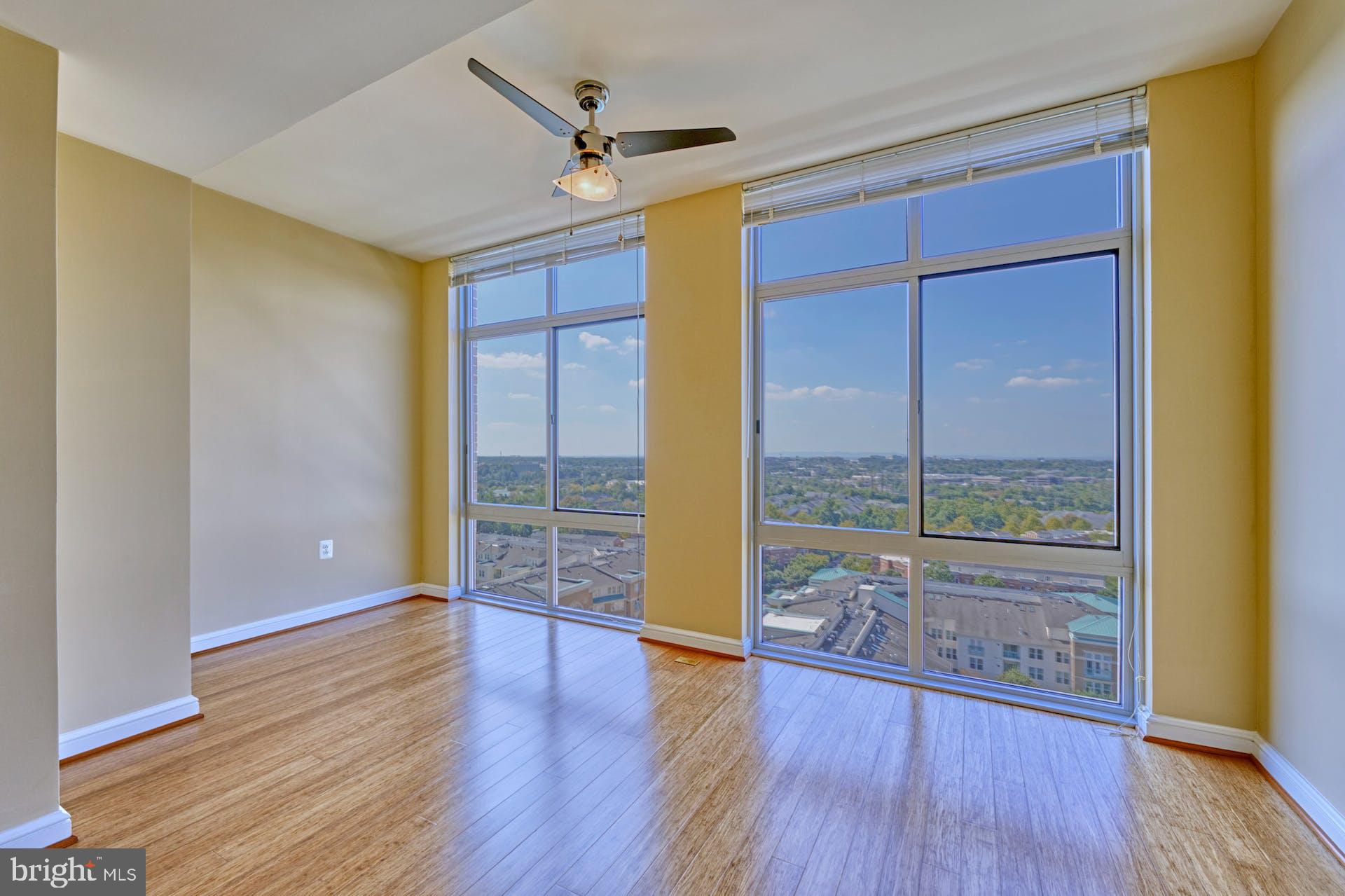 11990 Market Street, Unit 1314 Reston, VA 20190 - Photo 20 of 44 SUNROOM WITH EXPANSIVE WESTERN VIEW