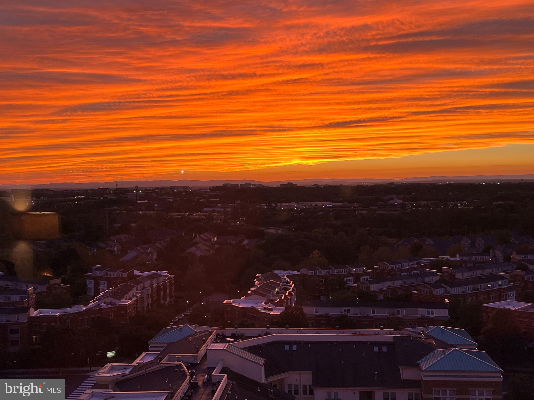 11990 Market Street, Unit 1314 Reston, VA 20190 - Photo 2 of 44 WESTERN SUNSET VIEW FROM CONDO