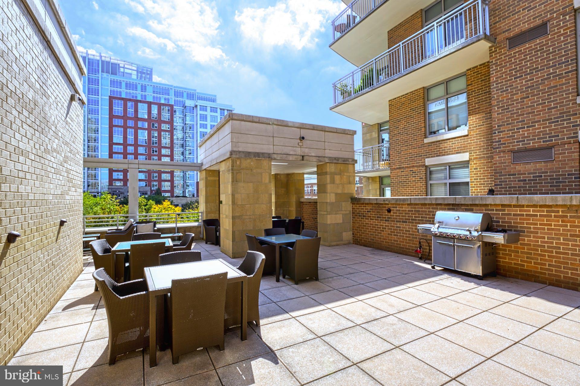 11990 Market Street, Unit 1314 Reston, VA 20190 - Photo 37 of 44 MIDTOWN RESTON COMMUNITY TERRACE W/ GAS GRILL