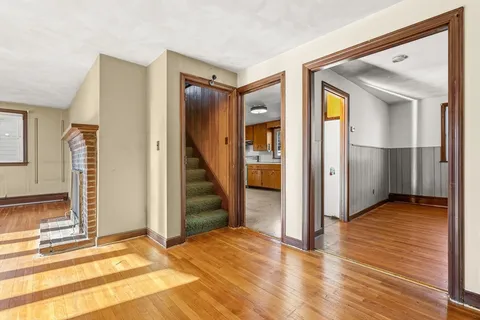 a kitchen with stainless steel appliances granite countertop a stove sink and cabinets