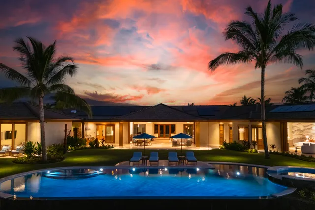 a view of a lake with a table and chairs
