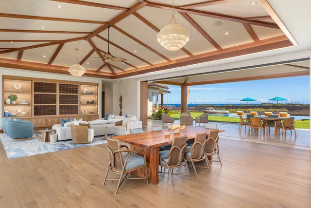 a view of a dining room with furniture window and outside view