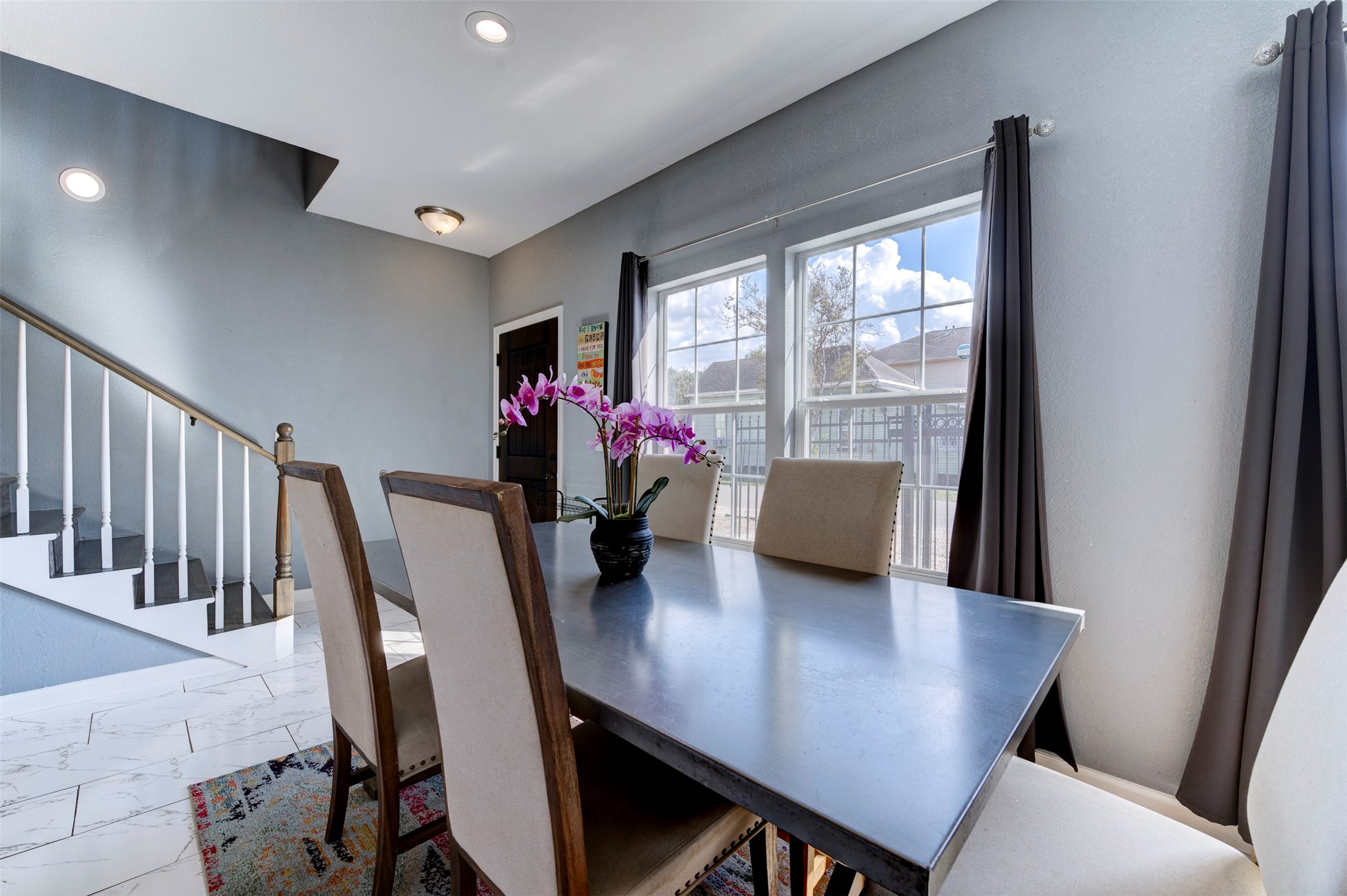 301 Tabor Street Houston, TX 77009 - Photo 11 of 33 a view of a dining room with furniture and wooden floor