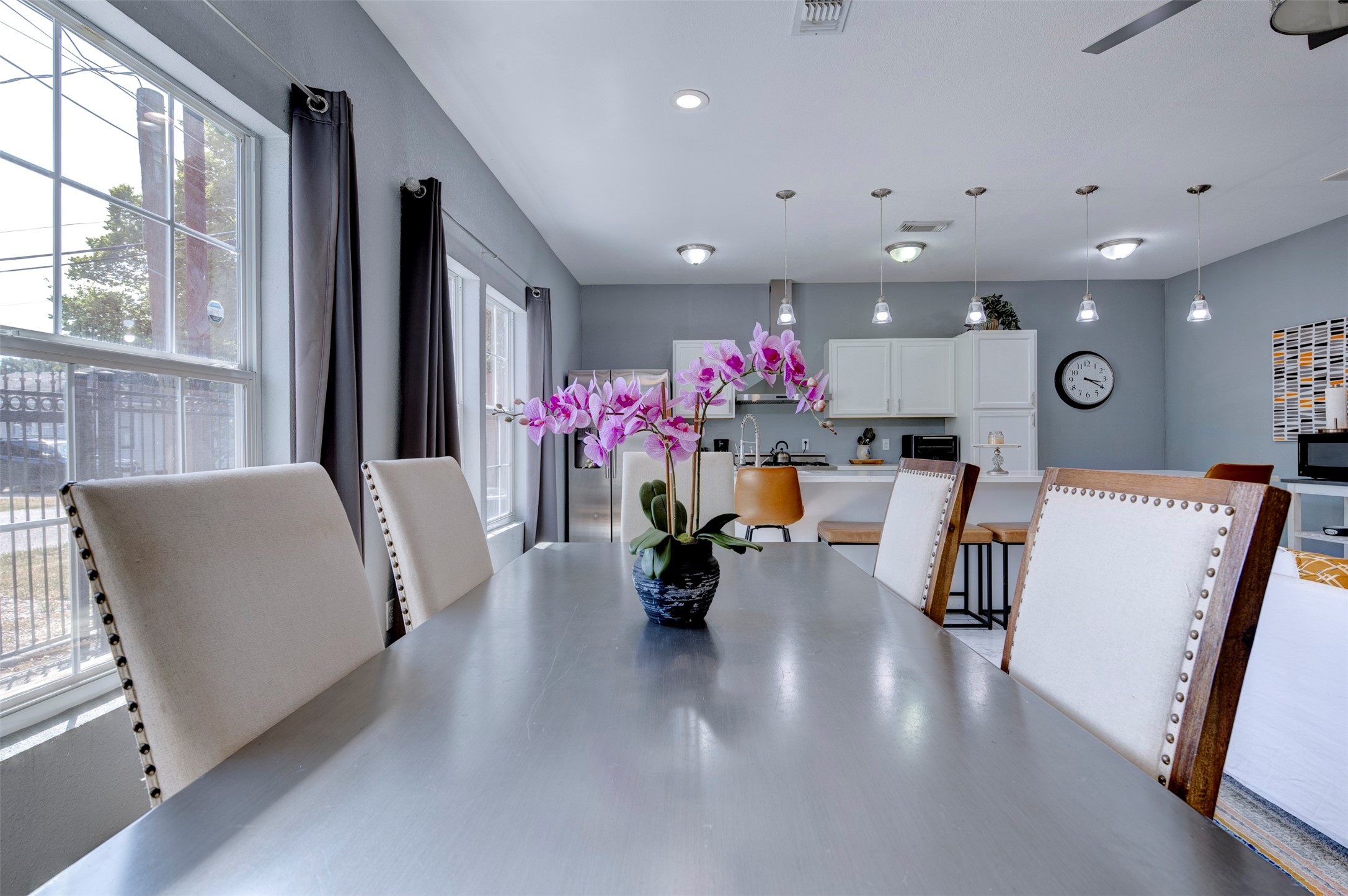 301 Tabor Street Houston, TX 77009 - Photo 12 of 33 a living room with furniture and a chandelier