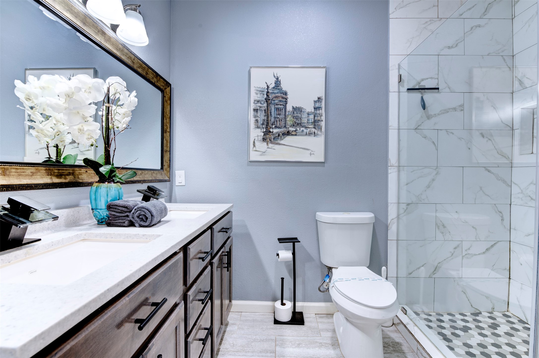 301 Tabor Street Houston, TX 77009 - Photo 17 of 33 a bathroom with a toilet sink and mirror