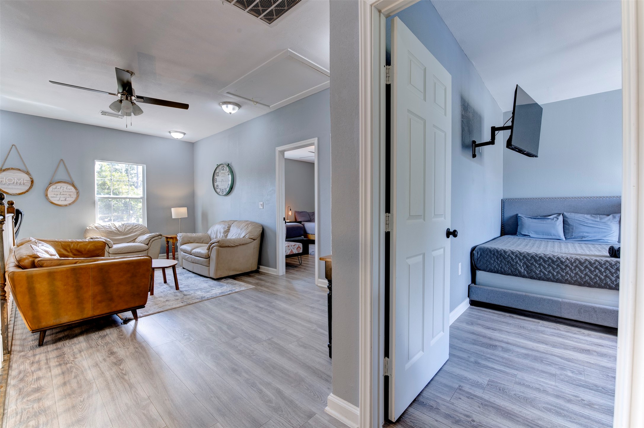 301 Tabor Street Houston, TX 77009 - Photo 19 of 33 a living room with furniture and a wooden floor