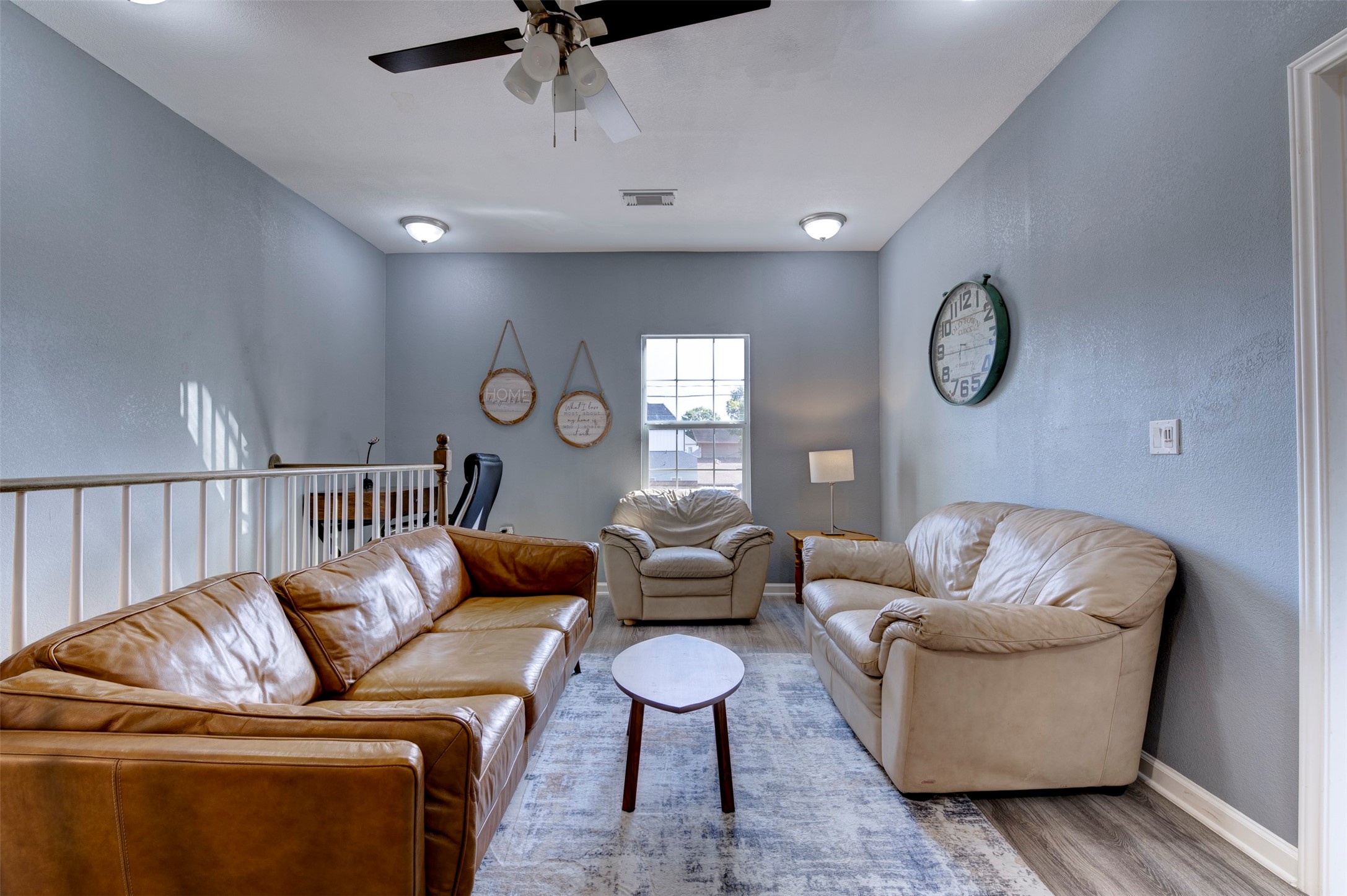 301 Tabor Street Houston, TX 77009 - Photo 21 of 33 a living room with furniture and a large window