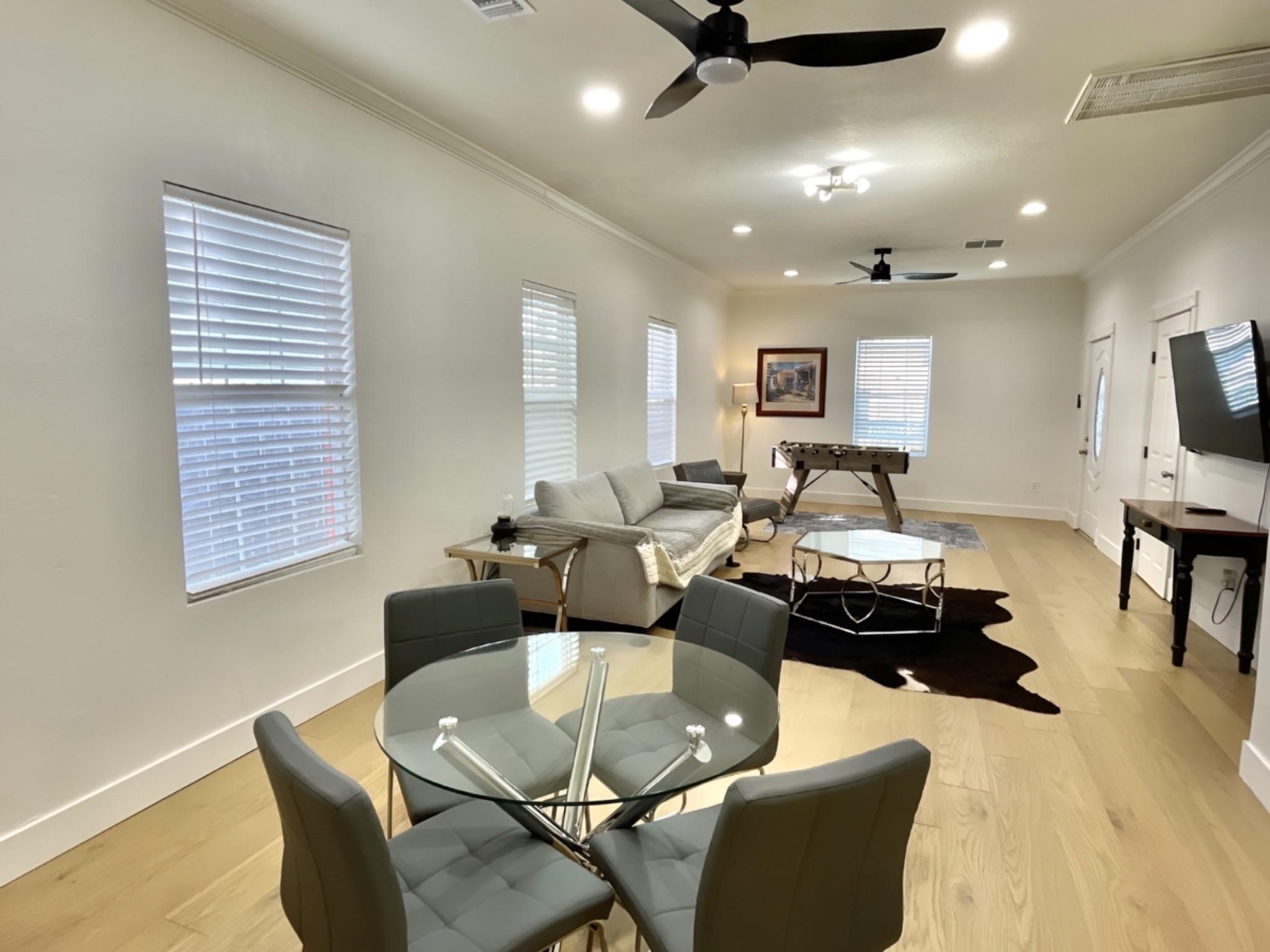 301 Tabor Street Houston, TX 77009 - Photo 31 of 33 a living room with furniture and a flat screen tv
