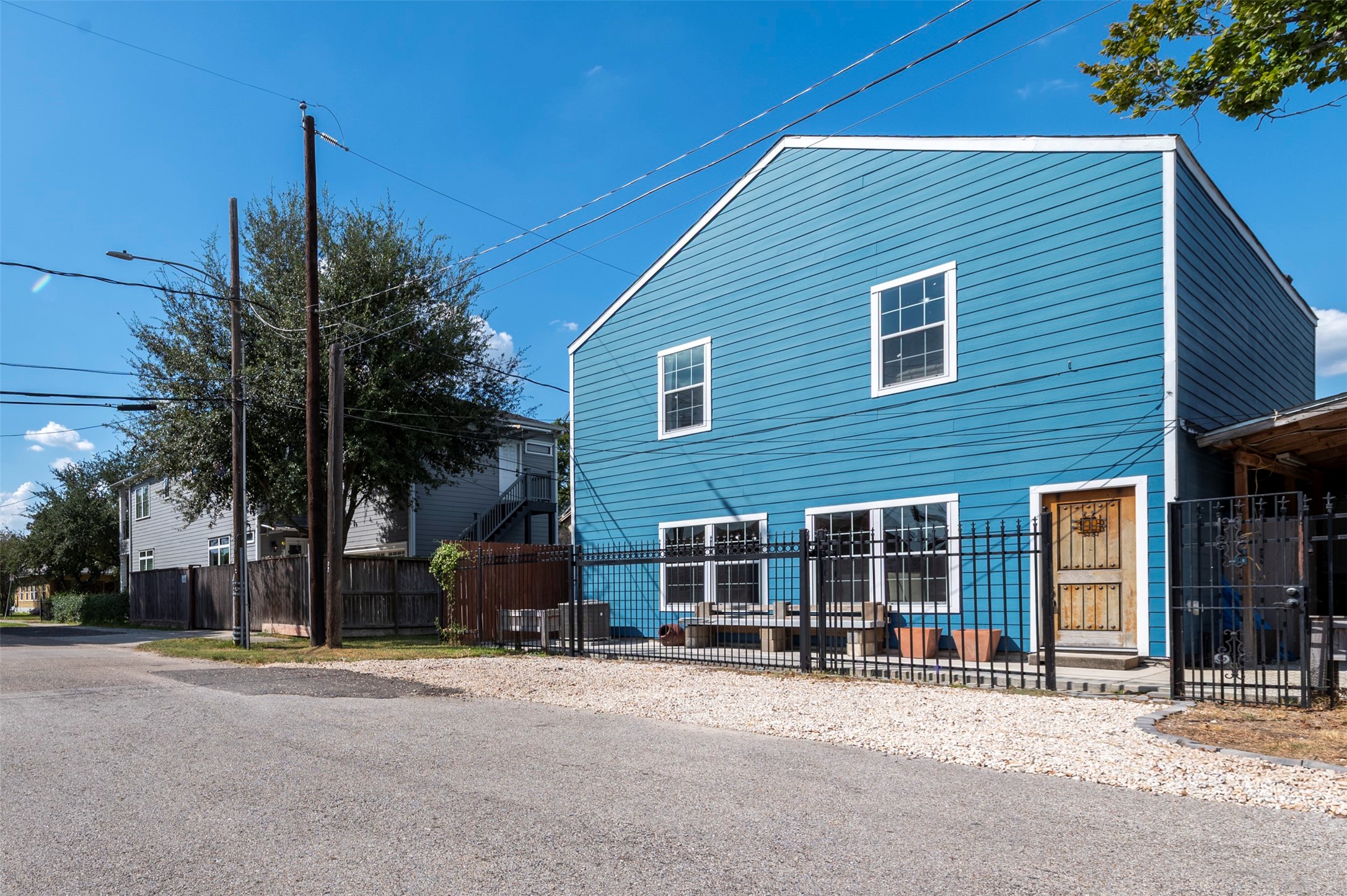 301 Tabor Street Houston, TX 77009 - Photo 4 of 33 a front view of a house with a road