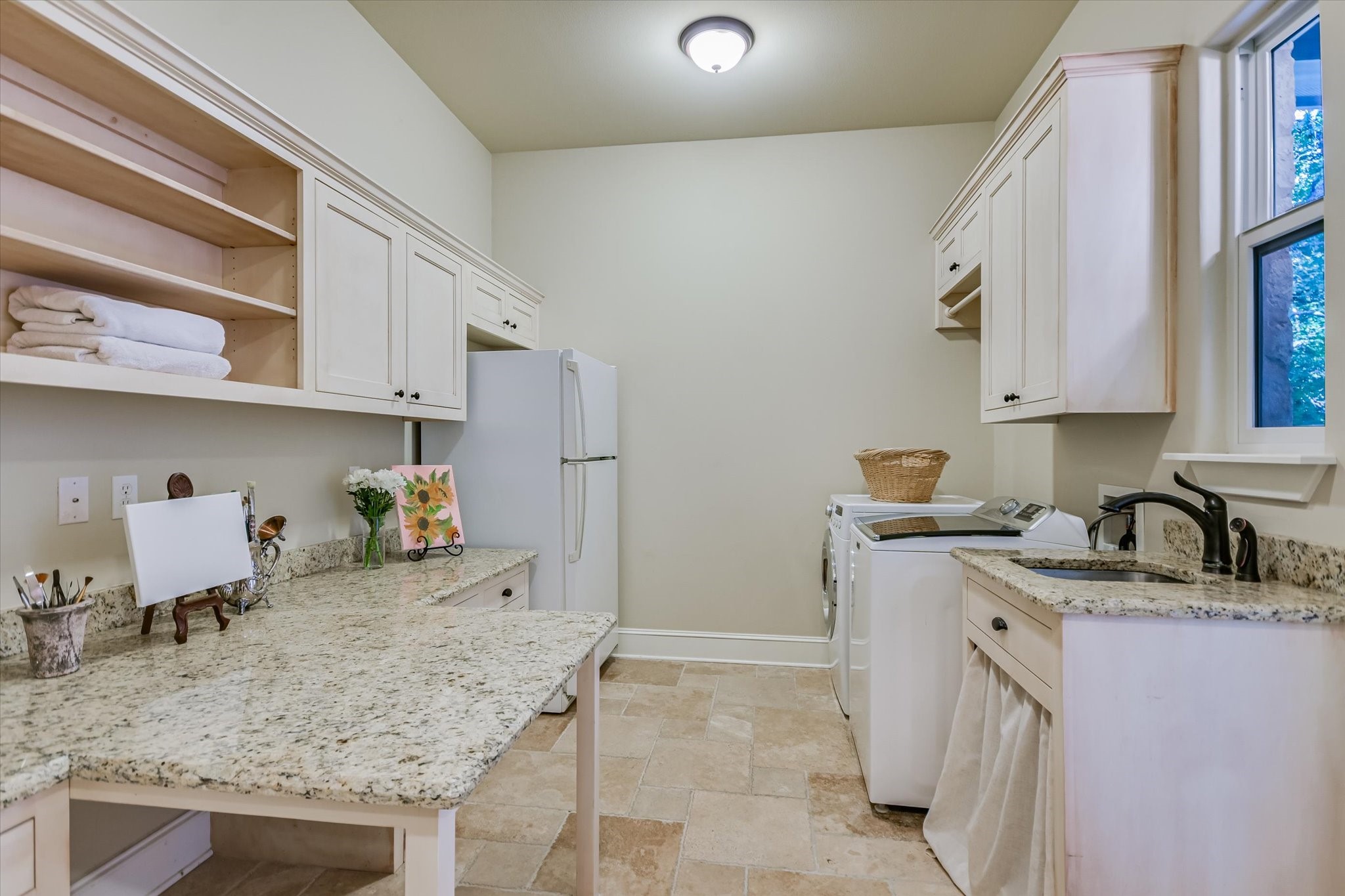 112 Gabriel Vista East Georgetown, TX 78633 - Photo 22 of 34 a kitchen with sink cabinets and stove