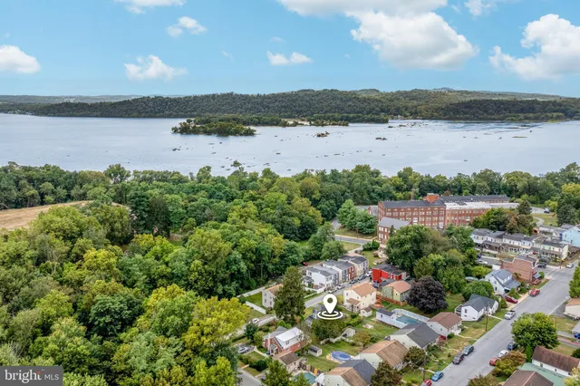 a view of lake with mountain in background