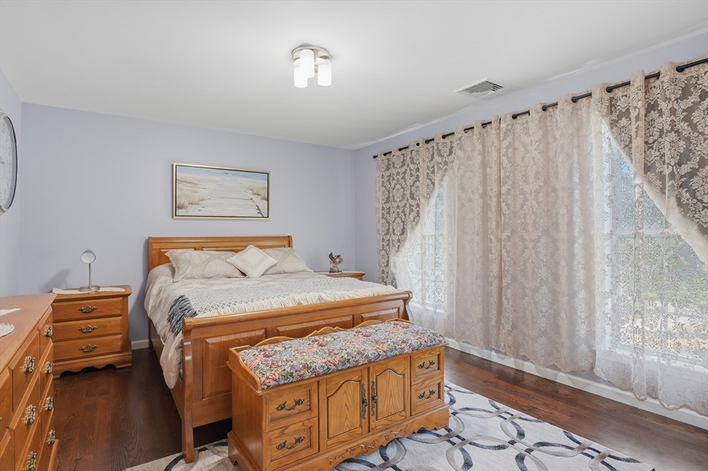 112 Pineland Avenue Worcester, MA 01604 - Photo 26 of 38 a bedroom with a bed and a window