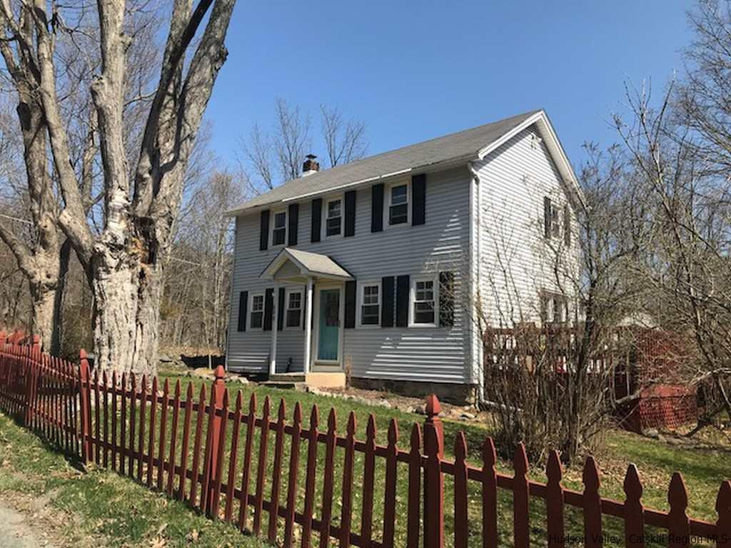 183 Beecher Hill Road Wallkill, NY 12589 - Photo 1 of 33 a front view of a house with a yard