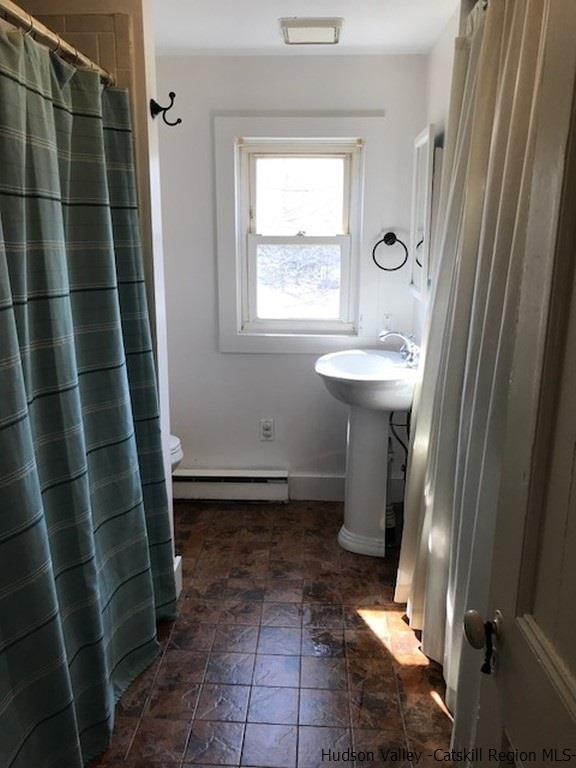 183 Beecher Hill Road Wallkill, NY 12589 - Photo 23 of 33 a bathroom with a sink toilet and shower