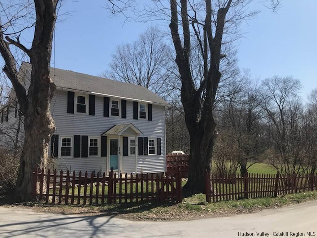183 Beecher Hill Road Wallkill, NY 12589 - Photo 27 of 33 front view of a house with a tree