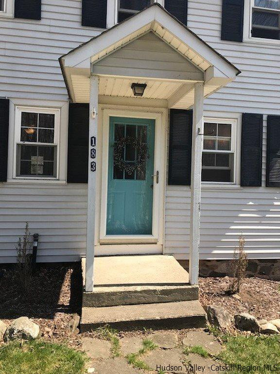 183 Beecher Hill Road Wallkill, NY 12589 - Photo 3 of 33 a front view of a house with a yard