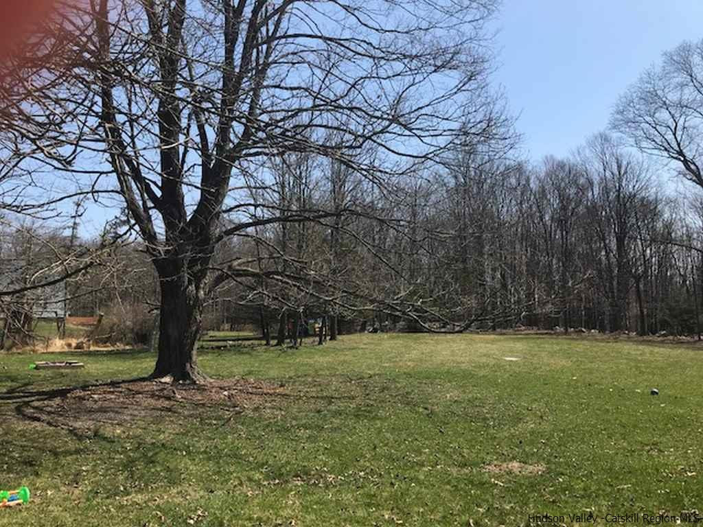 183 Beecher Hill Road Wallkill, NY 12589 - Photo 33 of 33 a view of outdoor space with trees all around