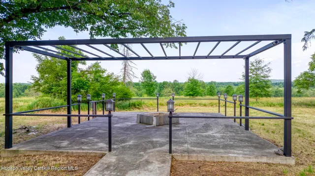 a view of outdoor space with deck and yard