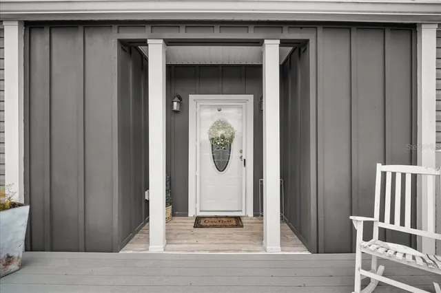 a door of a house with wooden door