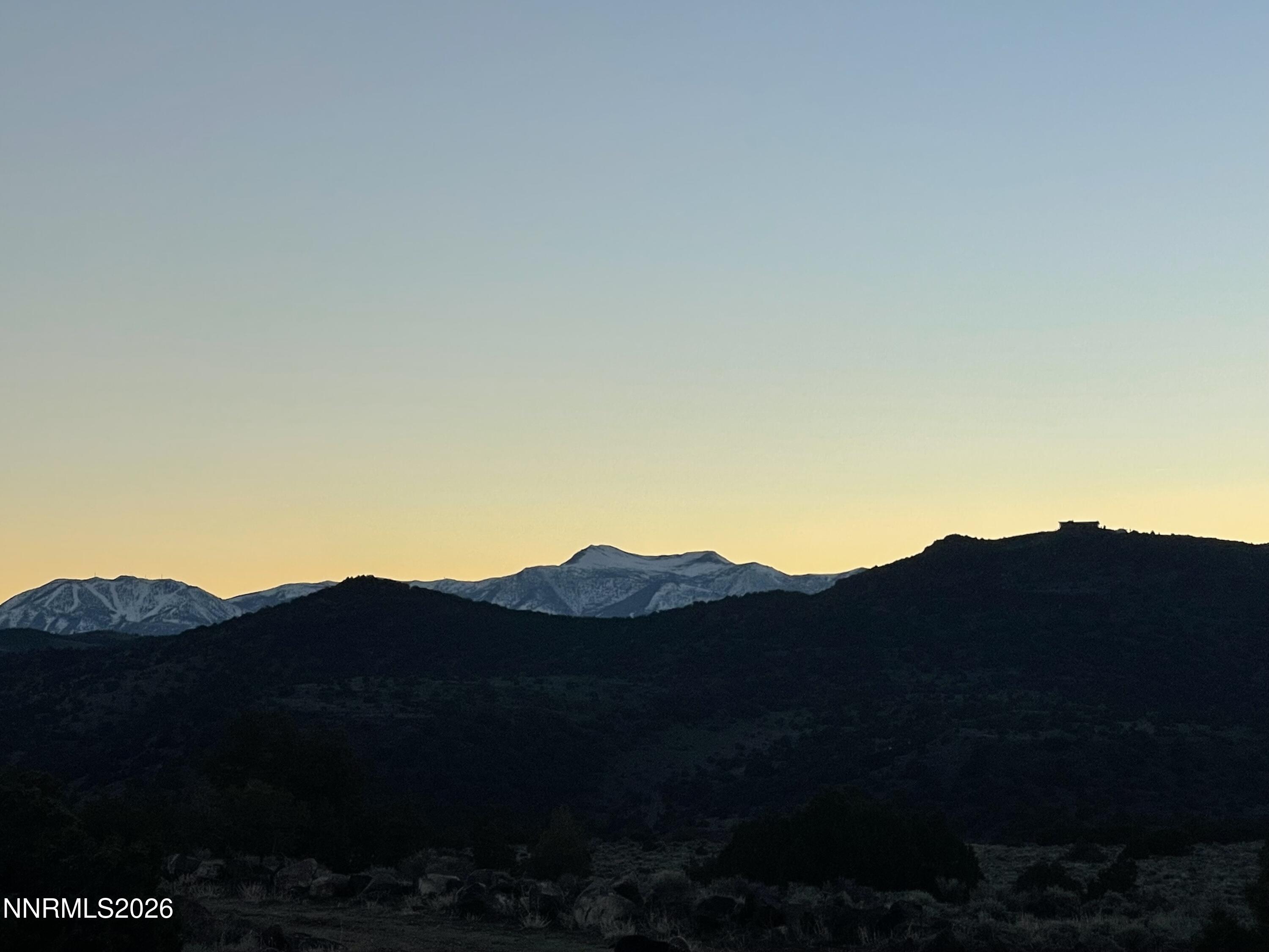 6600 Goldfield Road Reno, NV 89521 - Photo 12 of 23 a view of a house with a mountain view
