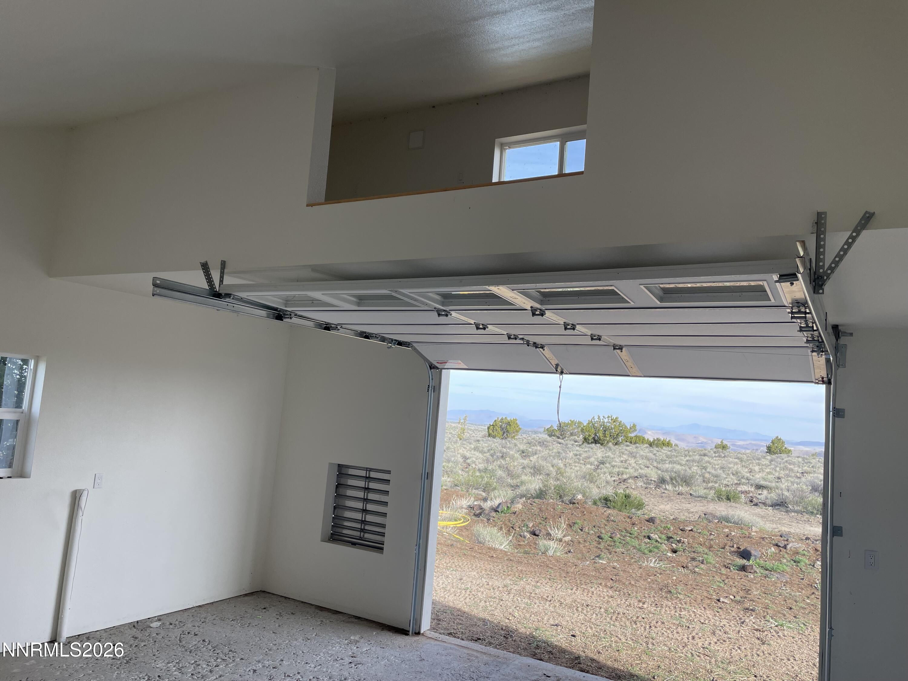 6600 Goldfield Road Reno, NV 89521 - Photo 6 of 23 a view of a livingroom with wooden floor