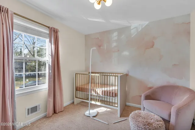 a view of livingroom with furniture and windows