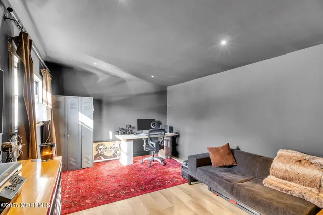 a bed room with a bed and a couch