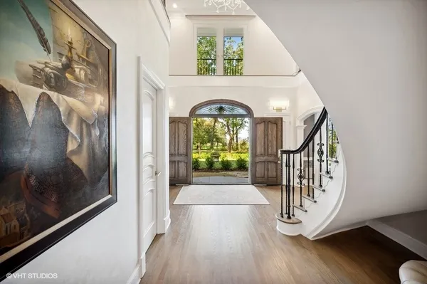 a view of entryway with wooden floor