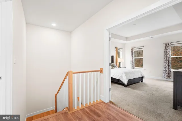 a bathroom with a shower and a bath tub