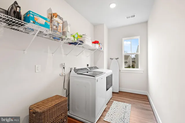 a view of a house with a yard and garage