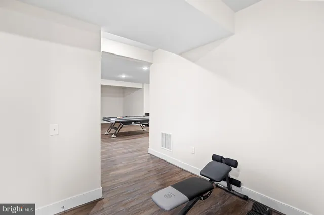 an aerial view of a house with a garden