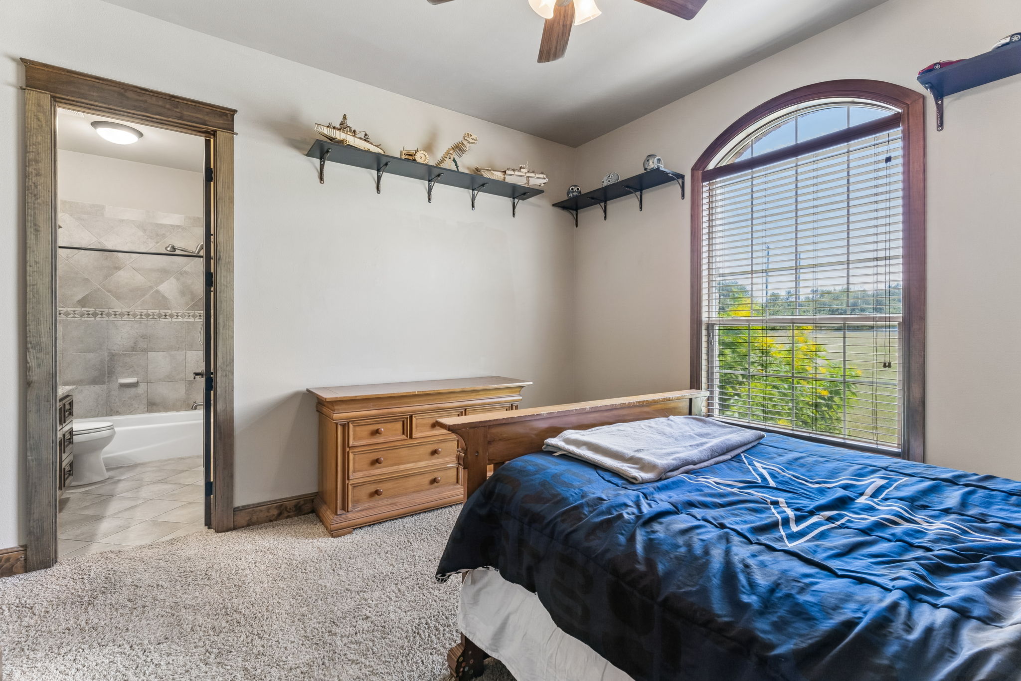 438 Patricia Road Georgetown, TX 78628 - Photo 21 of 36 Second bedroom w/ ensuite bathroom for added privacy.