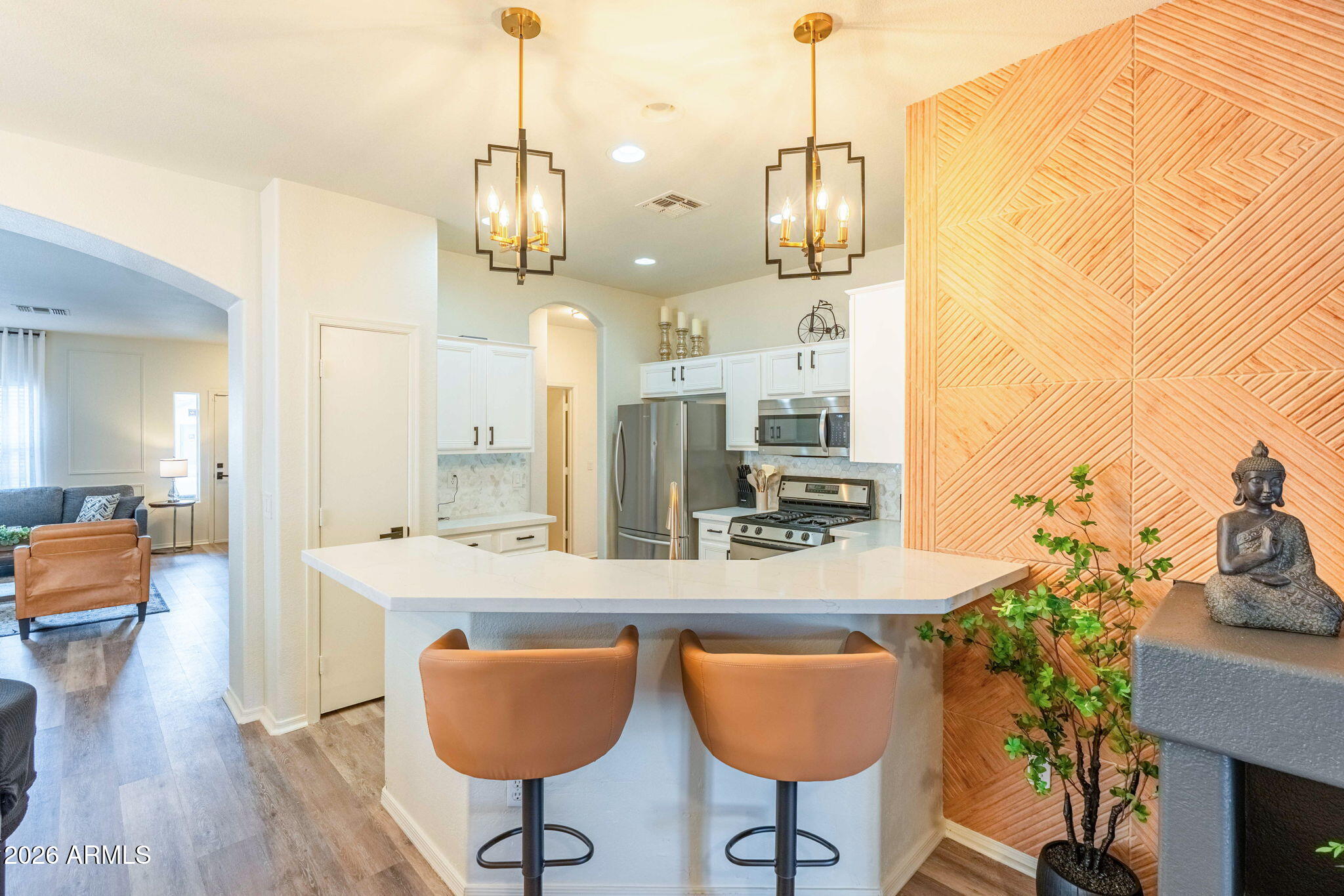 3674 South Joshua Tree Lane Gilbert, AZ 85297 - Photo 6 of 30 a dining room with furniture and wooden floor