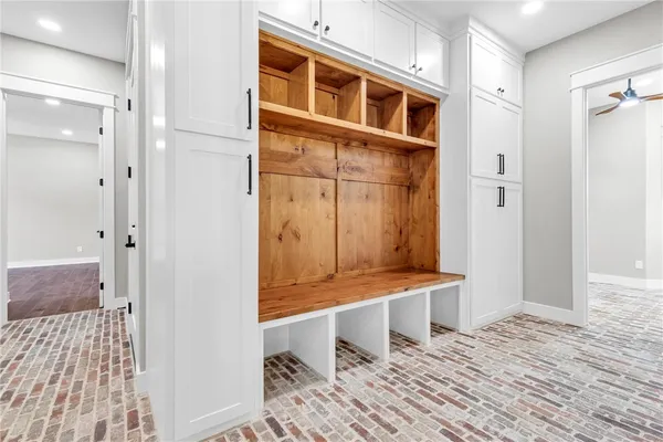 a room with window and furniture