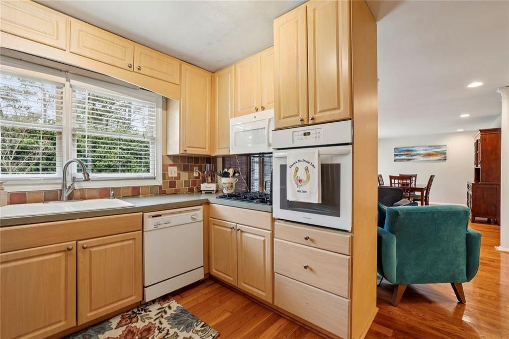 13325 Providence Road Milton, GA 30009 - Photo 12 of 50 a kitchen with a sink cabinets and window