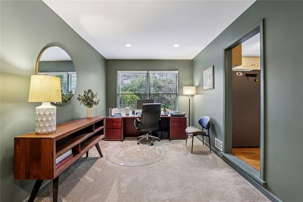 13325 Providence Road Milton, GA 30009 - Photo 14 of 50 a view of a workspace with furniture and a window