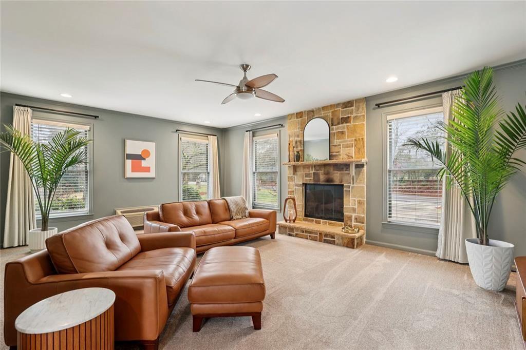 13325 Providence Road Milton, GA 30009 - Photo 16 of 50 a living room with furniture ceiling fan and a window