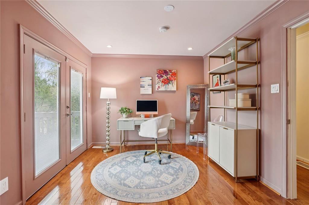 13325 Providence Road Milton, GA 30009 - Photo 21 of 50 a living room with furniture a large window and wood floor