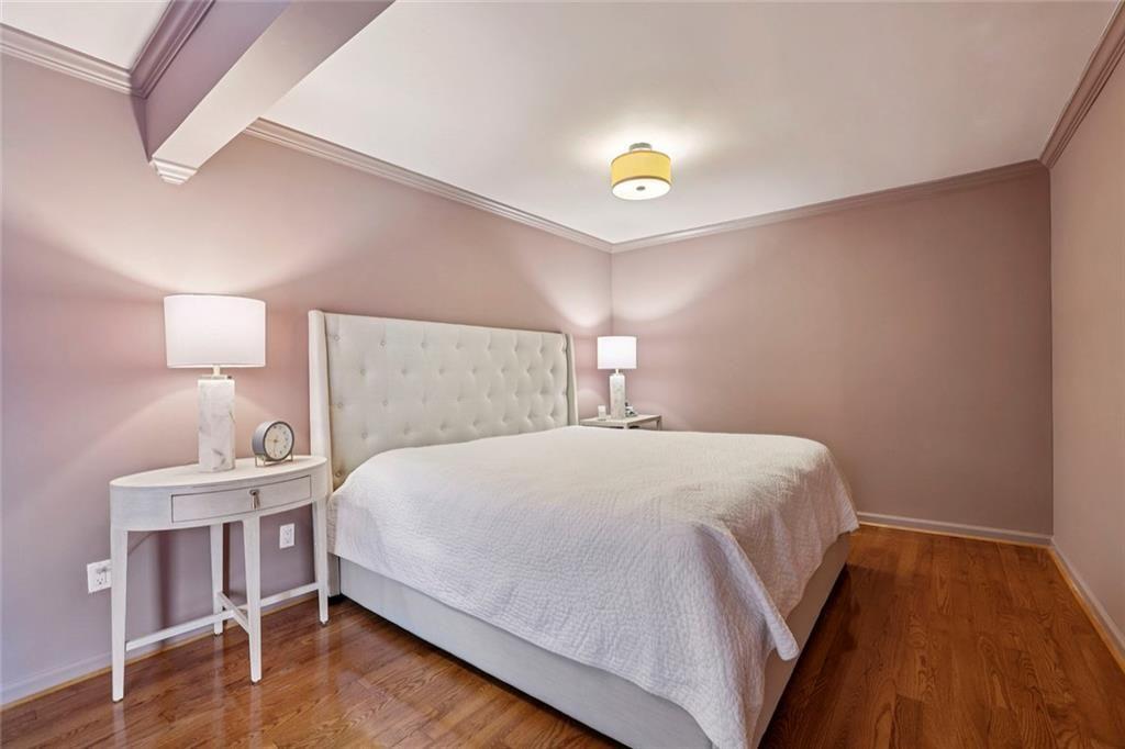 13325 Providence Road Milton, GA 30009 - Photo 22 of 50 a bedroom with a bed and a night stand