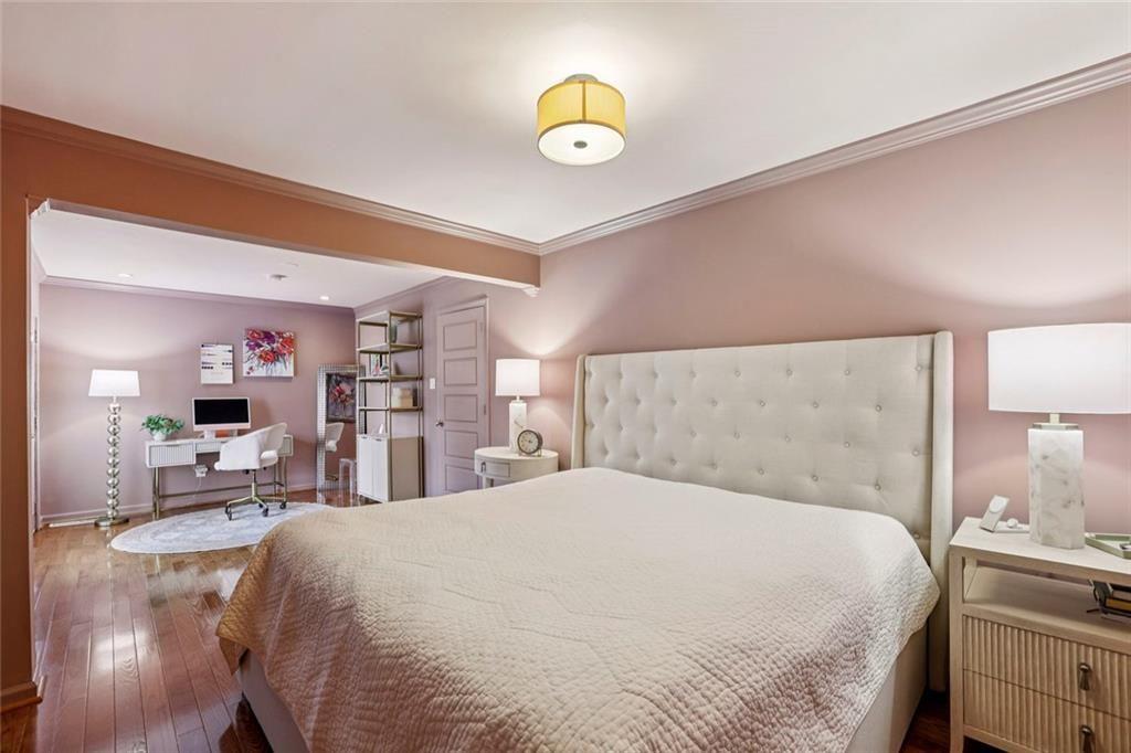 13325 Providence Road Milton, GA 30009 - Photo 23 of 50 a bedroom with a bed and a chandelier