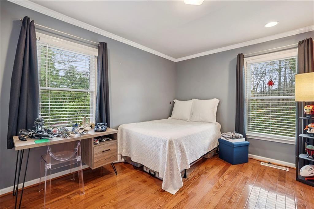 13325 Providence Road Milton, GA 30009 - Photo 26 of 50 a bedroom with a bed and a window