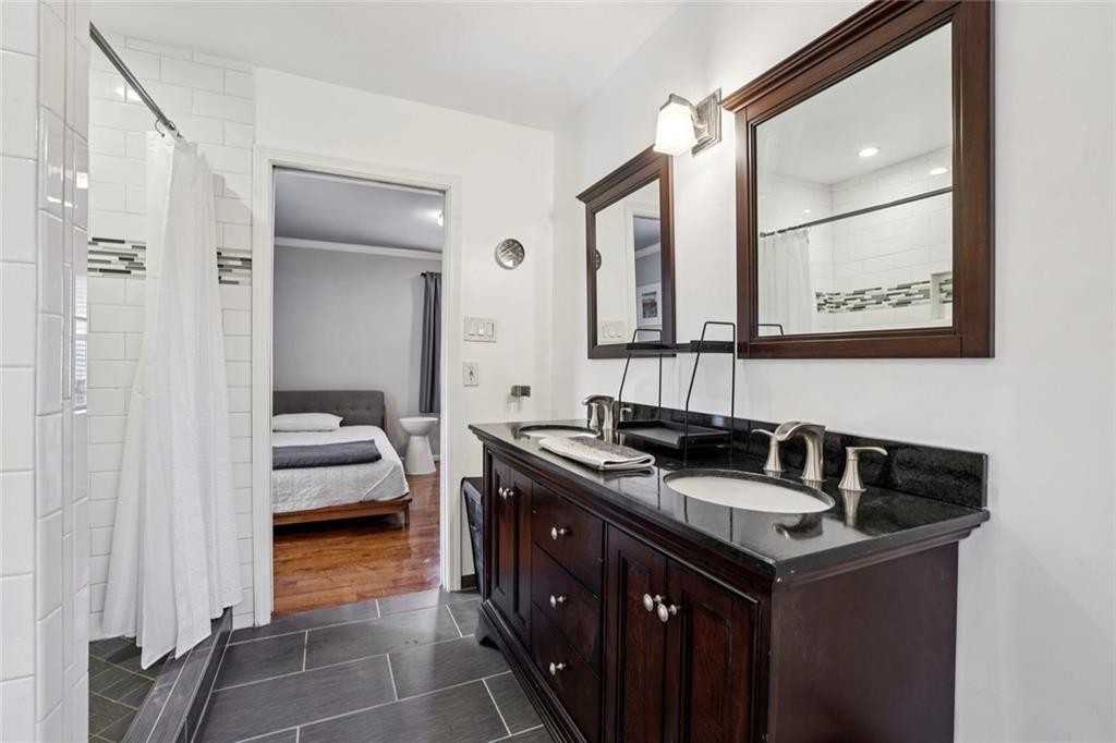 13325 Providence Road Milton, GA 30009 - Photo 27 of 50 a kitchen with a sink stove and cabinets