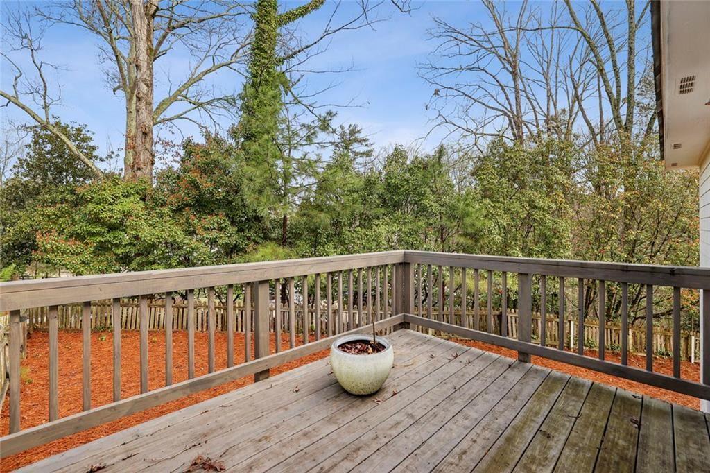 13325 Providence Road Milton, GA 30009 - Photo 36 of 50 a view of balcony with wooden floor and seating