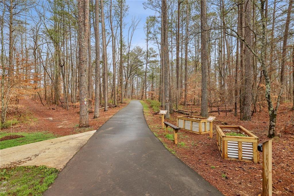 13325 Providence Road Milton, GA 30009 - Photo 40 of 50 a view of swimming pool with outdoor seating